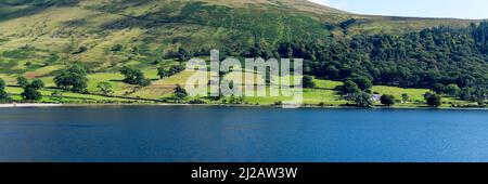 Wast Water or Wastwater is a lake located in Wasdale, a valley in the western part of the Lake District National Park, England, UK, beautiful summer d Stock Photo