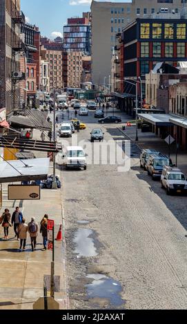Meatpacking and Chelsea district street aerial view with red brick wall ...