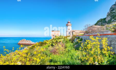 Incredible sunny day over Capo Zafferano Lighthouse. Popular travel destination of Mediterranean sea. Location: Santa Flavia, Province of Palermo, Sic Stock Photo