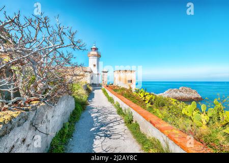 Stunning sunny day over Capo Zafferano Lighthouse. Popular travel destination of Mediterranean sea. Location: Santa Flavia, Province of Palermo, Sicil Stock Photo