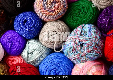Full frame of colorful, assorted yarns Stock Photo