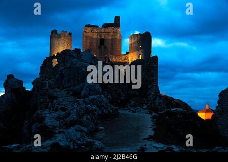 Italy, Abruzzo region, February 25, 2022 : The castle of Rocca Calascio and (R) the church of Santa Maria della Pietà in Abruzzo, province of L'Aquila Stock Photo