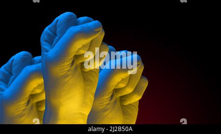 Fist in colors of Ukrainian Flag raised to fight and resist russian agression Stock Photo