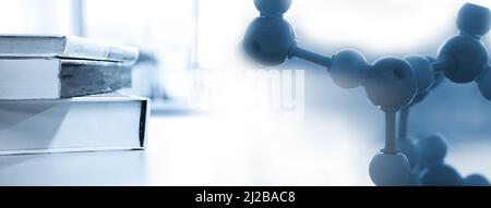 molecular chemistry structure and text book stack in education medical health science lab technology banner background Stock Photo
