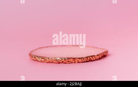 Product pedestal on pink background. Podium in minimalistic style. Showcase for goods. High quality photo Stock Photo