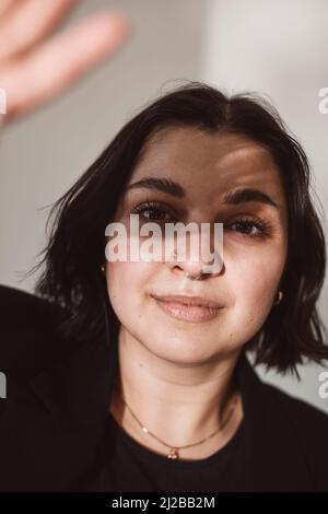 Portrait of young woman in studio Stock Photo
