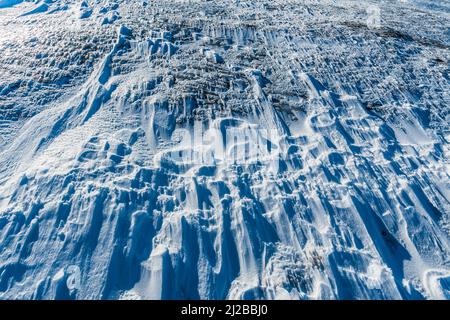Texture of snow and ice on a layer of ice on a mountain top in Norway Stock Photo