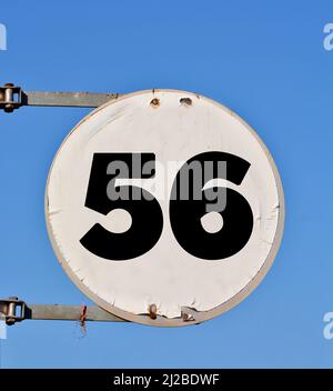 Sign with a number, 56 Stock Photo - Alamy