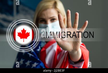 flag of canada and inscription immigration Stock Photo