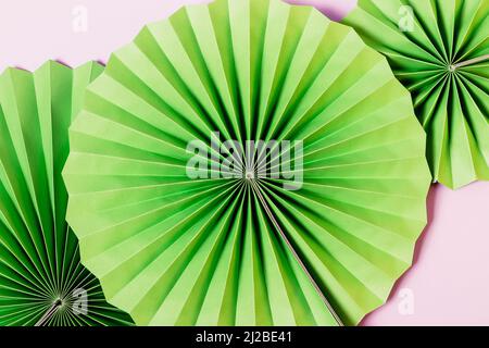 Folded paper texture abstract background with paper fans decoration of different sizes Stock Photo