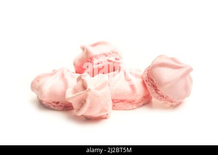 Pink meringues on a white background with copy space Stock Photo