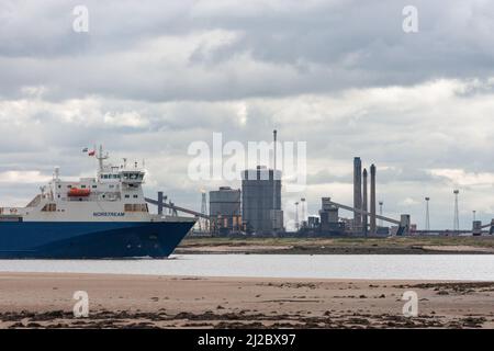 View from North Gare beach near Seaton Carew with Redcar steelworks on the south side of the Tess estuary in background. England. UK Stock Photo