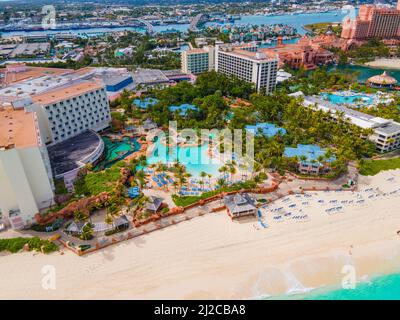 The Coral Hotel at Atlantis Resort aerial view with Nassau downtown at the background on Paradise Island, Bahamas. Stock Photo