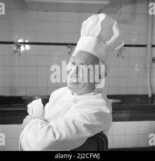 1950s smiling chef in a large kitchen ca: June 26, 1954 Stock Photo