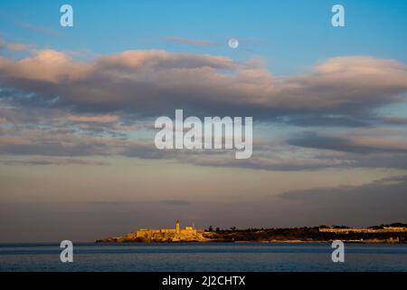 Super blood wolf moon sunset over el Malacon sea on January 2019 in Havana, Cuba. Stock Photo