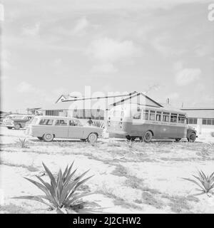 The parking lot of the Zanderij airport in Suriname ca. October 1, 1955 Stock Photo