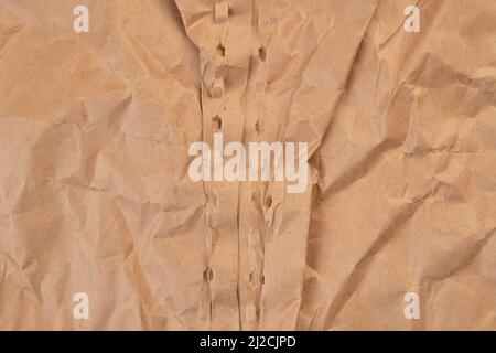 Aged wrapping recycled crumpled brown kraft paper texture Stock Photo