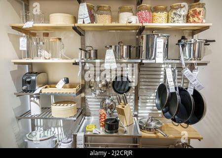 Miami Florida IKEA home goods furnishings accessories furniture decor shopping shoppers inside interior display sale kitchen pans pots utensils Stock Photo