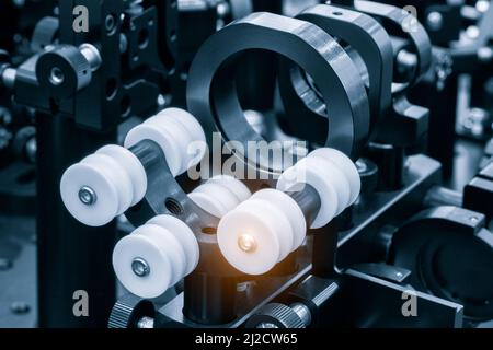 Experiment in photonic laboratory with laser Stock Photo