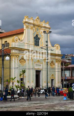 Baroque facade of the Church of Santa Maria degli Angeli (15-18th centuries) in the centre of Sanremo with people walking, Imperia, Liguria, Italy Stock Photo