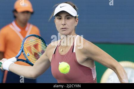 Miami Gardens, United States. 31st Mar, 2022. Belinda Bencic from Switzerland returns a forehand shot to Naomi Osaka from Japan during the semi-finals at the Miami Open in the Hard Rock Stadium in Miami Gardens, Florida, on Thursday, March 31, 2022. Photo by Gary I Rothstein/UPI Credit: UPI/Alamy Live News Stock Photo