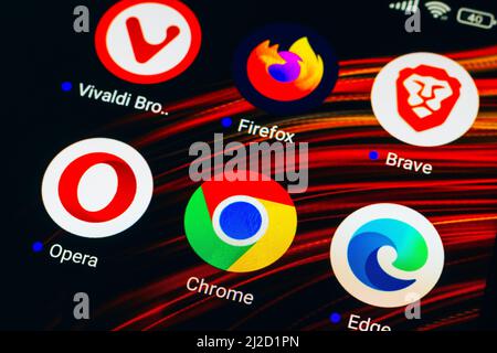 In this photo illustration the Vivaldi, Firefox, Brave, Opera, Google Chrome and Microsoft Edge app icons seen displayed on a smartphone screen. Stock Photo