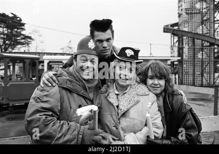 EastEnders went to Southend, Essex, to film the reunion of runaway Mark Fowler and his family. Bill Treacher (Arthur Fowler), David Scarboro (Mark Fowler), Susan Tully (Michelle Fowler) and Wendy Richard (Pauline Fowler). 20th November 1985. Stock Photo