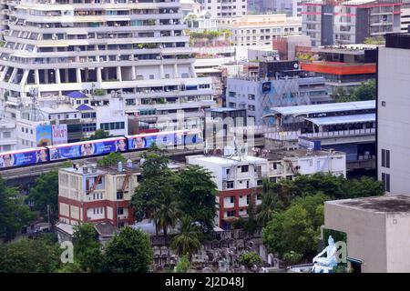 Overhead or aerial view of a skytrain entering Chong Nonsi station, in Bangkok, Thailand, Asia. Stock Photo