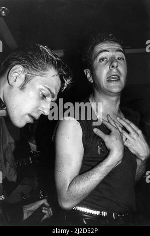 The Clash playing live in a pub in Leeds, they stunned fans with a blitz of unannounced gigs. This was part of their busking tour of Britain. Pictured, Paul Simonon and Joe Strummer. May 1985. Stock Photo