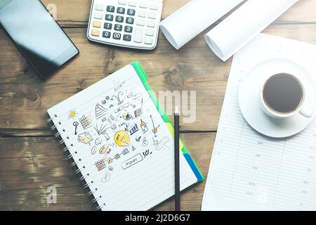 working wooden table on different office accessories Stock Photo