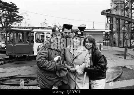 EastEnders went to Southend, Essex, to film the reunion of runaway Mark Fowler and his family. Bill Treacher (Arthur Fowler), David Scarboro (Mark Fowler), Susan Tully (Michelle Fowler) and Wendy Richard (Pauline Fowler). 20th November 1985. Stock Photo