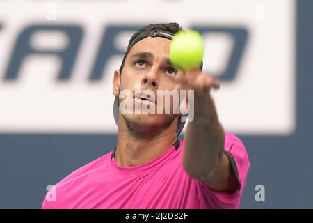 Francisco Cerundolo (ARG) moves to semi-finals after Jannik Sinner (ITA) retires at the Miami Open being played at Hard Rock Stadium in Miami Gardens, Florida on March 30, 2022: © Karla Kinne/Tennisclix/CSM Stock Photo