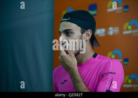 Francisco Cerundolo (ARG) moves to semi-finals after Jannik Sinner (ITA) retires at the Miami Open being played at Hard Rock Stadium in Miami Gardens, Florida on March 30, 2022: © Karla Kinne/Tennisclix/CSM Stock Photo