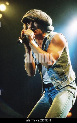 Australian rock group AC/DC performing on stage at Wembley Arena  during their 'Fly On The Wall ' World tour.  Pictured is singer Brian Johnson. 16th January 1986. Stock Photo