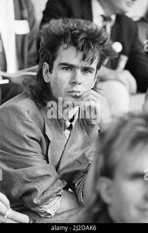 Live Aid dual venue benefit concert held on 13th July 1985 at Wembley Stadium in London, England, and the John F. Kennedy Stadium in Philadelphia, Pennsylvania, United States. The concerts were organised as a follow up to the Band Aid single 'Do They Know Its Christmas?'  to raise money for victims of the famine in Ethiopia. Picture shows Nick Kershaw  watching  the concert at Wembley. Stock Photo