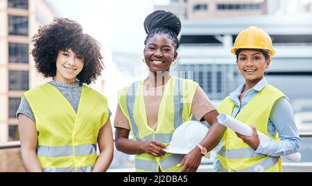 Supporting greater diversity to ensure the greatest success. Portrait of a group of confident young businesswomen working at a construction site. Stock Photo