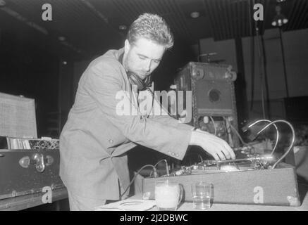 Former Specials keyboard player Jerry Dammers stepped in as DJ at the Cov Aid concert at the Lanchester Polytecnic in aid of famine relief in Ethiopia and Sudan.19th October 1985 Stock Photo