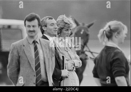 HRH Princess Diana, The Princess of Wales, at Guards Polo at Windsor, Berkshire. Seen standing next to the Princess, to her actual right is Barry Mannakee, Princess Diana's bodyguard.   He is wearing the dark jacket and diagonal striped tie.  Picture taken 20th June 1985 Stock Photo