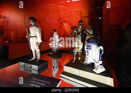 New York, USA. 31st Mar, 2022. Star Wars figurine of Luke Skywalker, Princess Leia, doids C-3PO and R2-D2 on display at The Fans Strike Back Exhibition, the largest Star Wars fan exhibition, New York, NY, March 31, 2022. The exhibition is a contains more than 600 fan-made 600 objects, characters, weapons and costumes based on the 12 Star Wars movies; Disney purchased Lucasfilm, the creator of Star Wars and its related films back in 2012 for more than $4 billion. (Photo by Anthony Behar/Sipa USA) Credit: Sipa USA/Alamy Live News Stock Photo