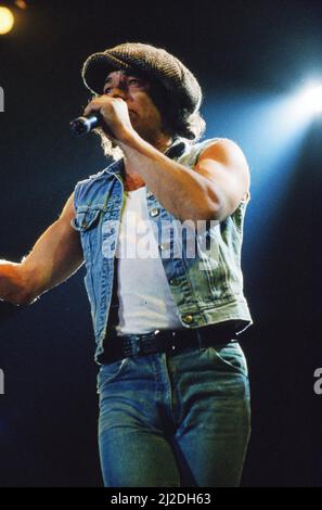 Australian rock group AC/DC performing on stage at Wembley Arena  during their 'Fly On The Wall ' World tour.  Pictured is singer Brian Johnson. 16th January 1986. Stock Photo