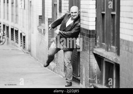 Liverpudlian comedian Alexei Sayle who starred in the BBC television comedy series The Young Ones, pictured in London. 17th May 1985. Stock Photo