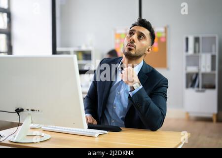 Hot Office Weather. Man Sweating At Work Stock Photo