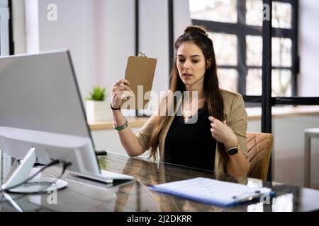 Hot Office Weather. Man Sweating At Work Stock Photo