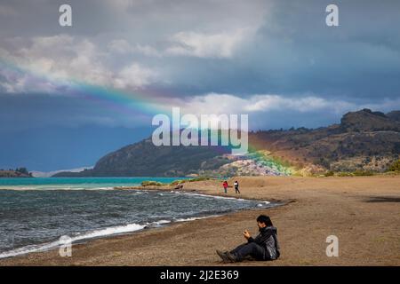 Chile 01-02-2020, a rainbow over the General Carrera lake at Puerto Rio Tranquilo. Stock Photo