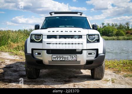 Russia, Rostovskaya oblast, 2021 June 09: Modern new SUV car Land Rover Defender, test drive in a wild. Offroad 4x4 driving for adventure. Stock Photo