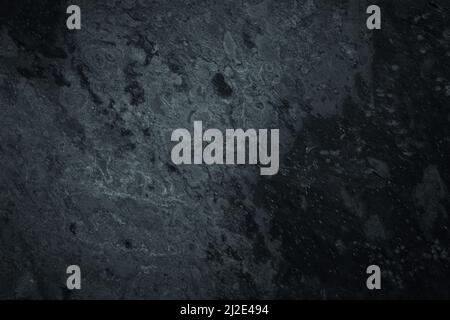 Dark worn grey and black slate background or texture Stock Photo