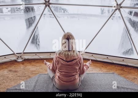 A Woman Does Yoga On The Terrace In A Geo Dome Glamping Tent. Stock Photo,  Picture and Royalty Free Image. Image 190093431.