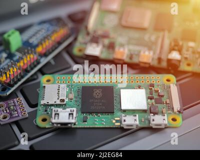 Galati, ROMANIA - March 31, 2022: Close-up of a new Raspberry Pi Zero 2 W with the new RP3A0, on a laptop keyboard. Stock Photo
