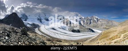 Diavolezza mountain cable car station panorama of the surrounding mountain range and glacier on a sunny blue sky autumn day Stock Photo