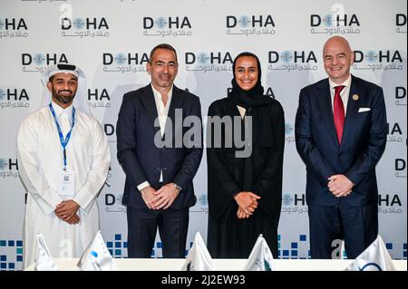 L to R: Qatar’s Supreme Committee for Delivery & Legacy Secretary General, Hassan al Thawadi, former French football player and CEO of the FIFA Foundation Youri Djorkaeff, CEO of Qatar Foundation Sheikha Hind bint Hamad Al Thani and FIFA President Giovanni Infantino, pose after signing an MOU at the Doha Forum in Doha, Qatar on March 26, 2022. Photo by MOFA-Balkis Press/ABACAPRESS.COM
